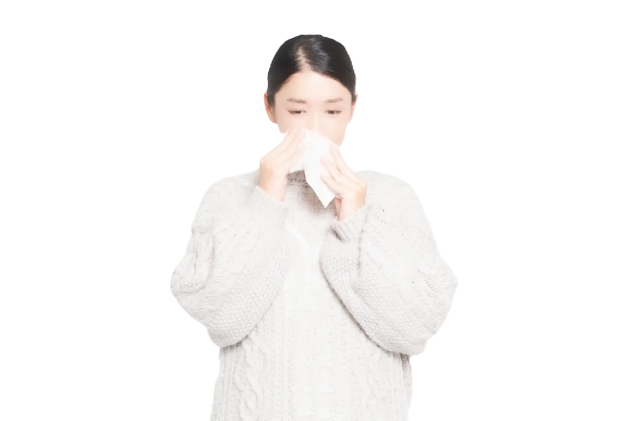 花粉症に悩む女性